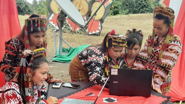 Students with their computers
