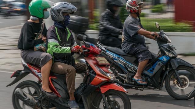 Mobile apps, such as Grab—a ride-hailing service that expanded to food delivery and package delivery, have thrived in Southeast Asia's booming digital economy. Photo credit: ADB.