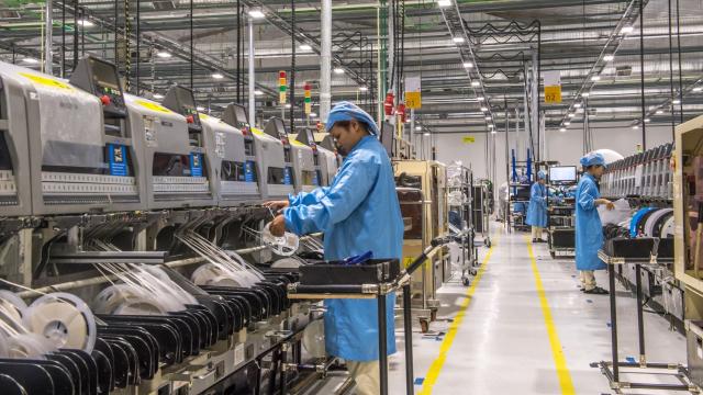 	Technicians and workers assemble electronic products in one of the factories inside the Savan Park Special Economic Zone in Savannakhet. Photo credit: ADB.